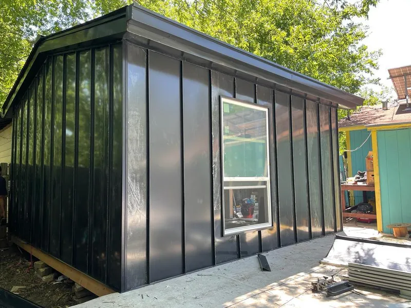 Black standing seam metal wall panels for Metal Roof Installation in Prairie Village