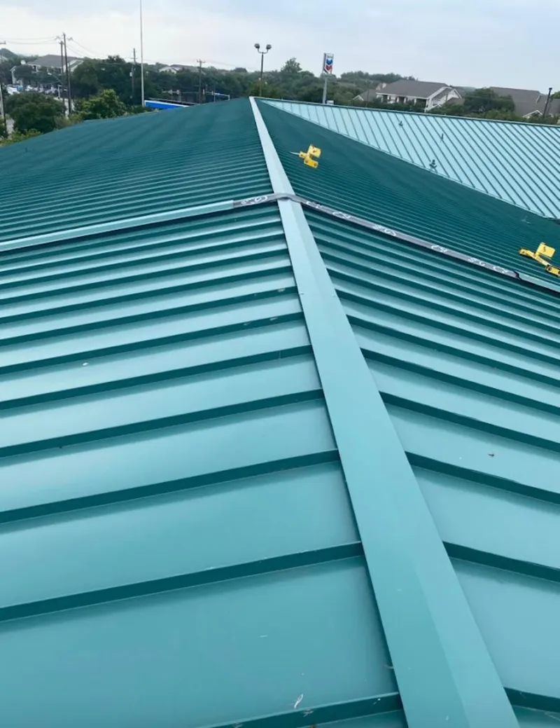 Green commercial metal roof ridge and valley for Metal Roof Repair in Prairie Village